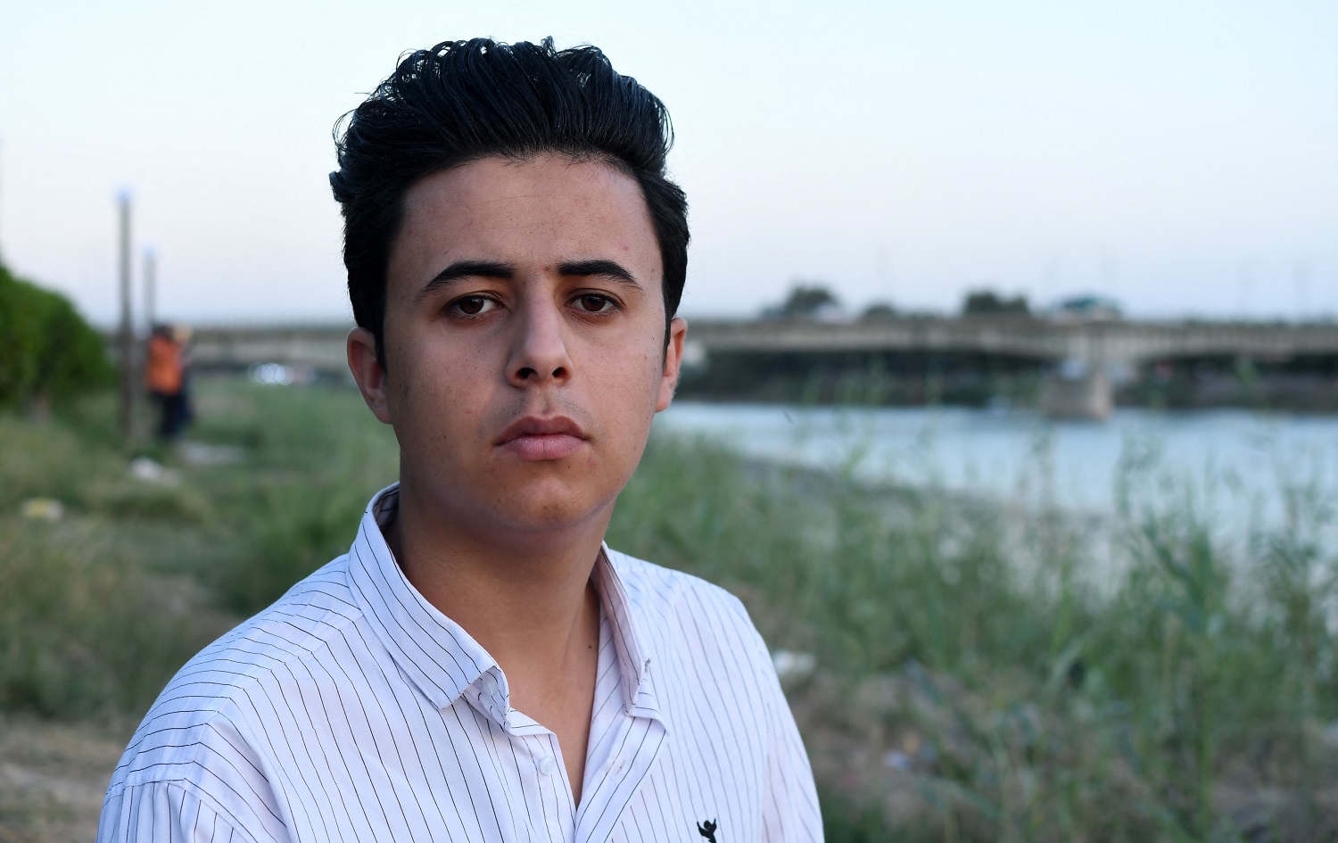 Hussein, a young Iraqi activist born in 2000, is pictured in his hometown Nasiriyah in Iraq's southern Dhi Qar province on April 4, 2021. Photo: Asaad Niazi/AFP
